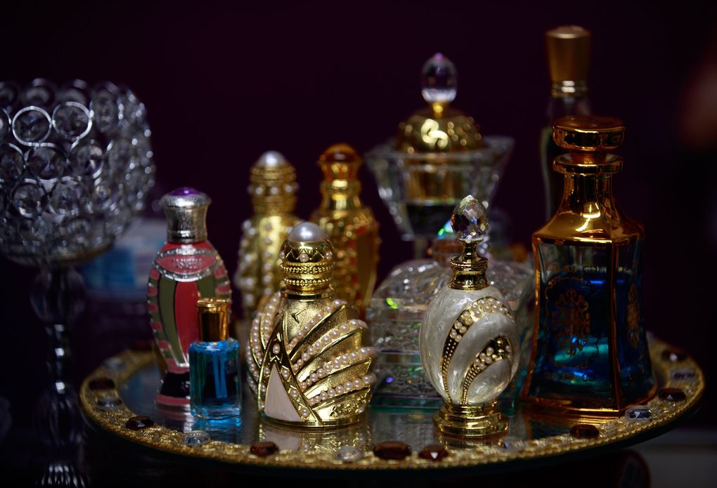 Displays of perfume at a stall at the SeaTac International Mall. (Erika Schultz / The Seattle Times)
