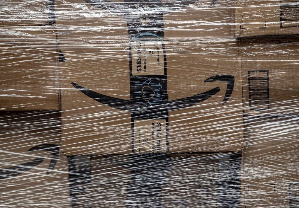 Amazon boxes during a delivery in 2020. The Seattle-based company is pausing plans for its annual sale Prime Day in Canada and India over concerns about COVID-19. (Victor J. Blue / Bloomberg)