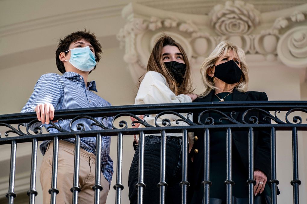 First lady Jill Biden, with her grandchildren Hunter and Natalie, watches as President Joe leaves the White House on March 19, 2021. The teens are described as the center of the first couple’s world. (Anna Moneymaker / The New York Times)