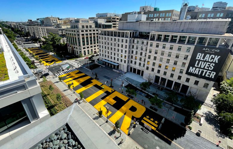 Black Lives Matter Plaza on 16th Street is repainted following the removal of the lettering for a construction project on May 13, 2021 in Washington, D.C. The words “Black Lives Matter” was painted on the two block section of 16th Street last year in the wake of the George Floyd protest. (Kevin Dietsch/Getty Images/TNS) 17212358W 17212358W