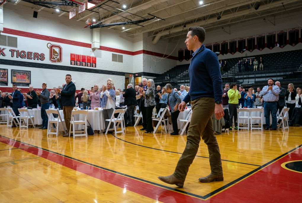 Hawley gets a standing ovation at Ozark High in April. (Photo by Christopher Smith for The Washington Post).