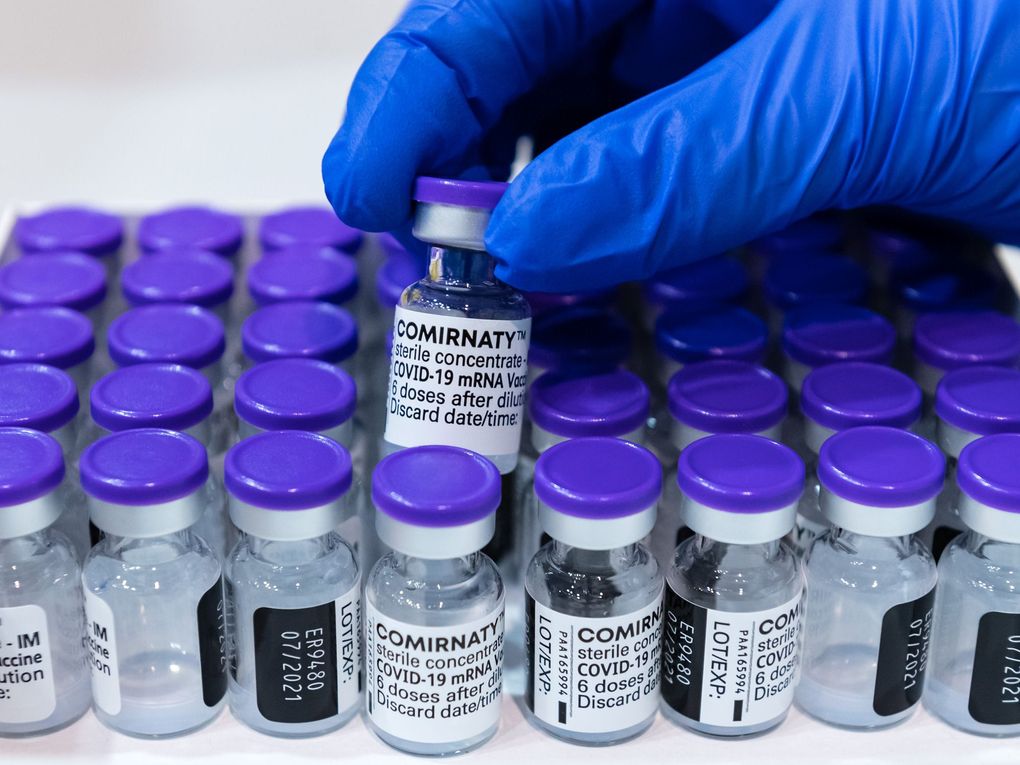 Vials of the Pfizer/BioNTech vaccine. (Photographer: Jens Schlueter/Getty Images Europe)