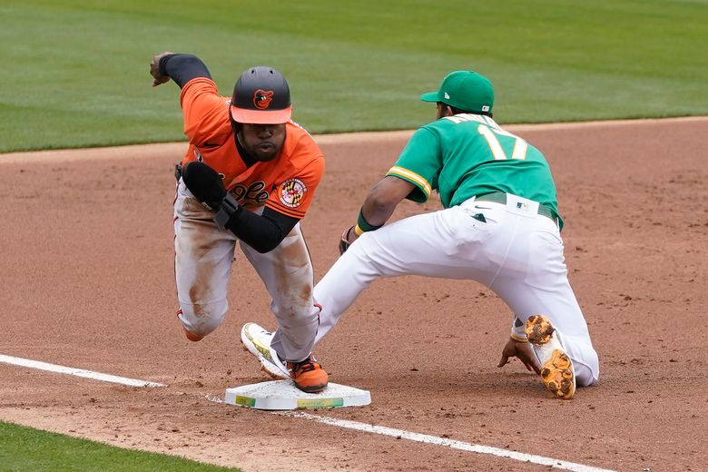 Orioles hit five homers to beat A's, win 4th straight