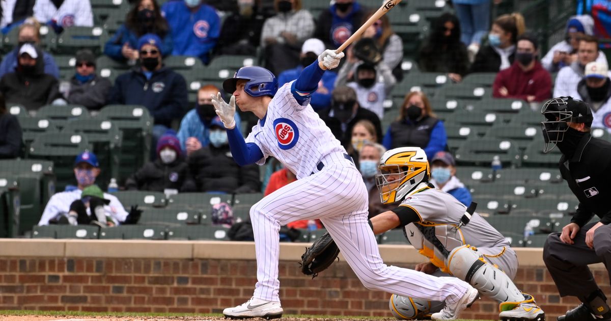 Chicago Cubs' Matt Duffy gives a thumbs-up as he rounds the bases