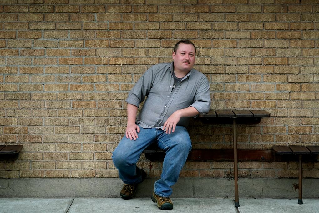 Nate Mullins, a former bartender from Oak Harbor, is looking for another profession that would provide health-care and retirement benefits. (Elaine Thompson / The Associated Press)