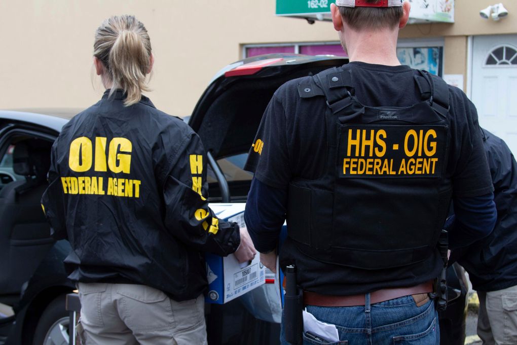 In this image provided by the Department of Health and Human Services, federal agents from Department of Health and Human Services Office of Inspector General engage in search warrant operations at a laboratory in Atlanta. More than 35 individuals associated with telemedicine companies and cancer genetic testing laboratories were charged for actions related to fraudulent genetic testing. The Justice Department announced charges on May 26, 2021, against more than a dozen people from Florida to California in a series of Medicare scams that exploited coronavirus fears to bill tens of millions of dollars in bogus claims. (Department of Health and Human Services via AP)