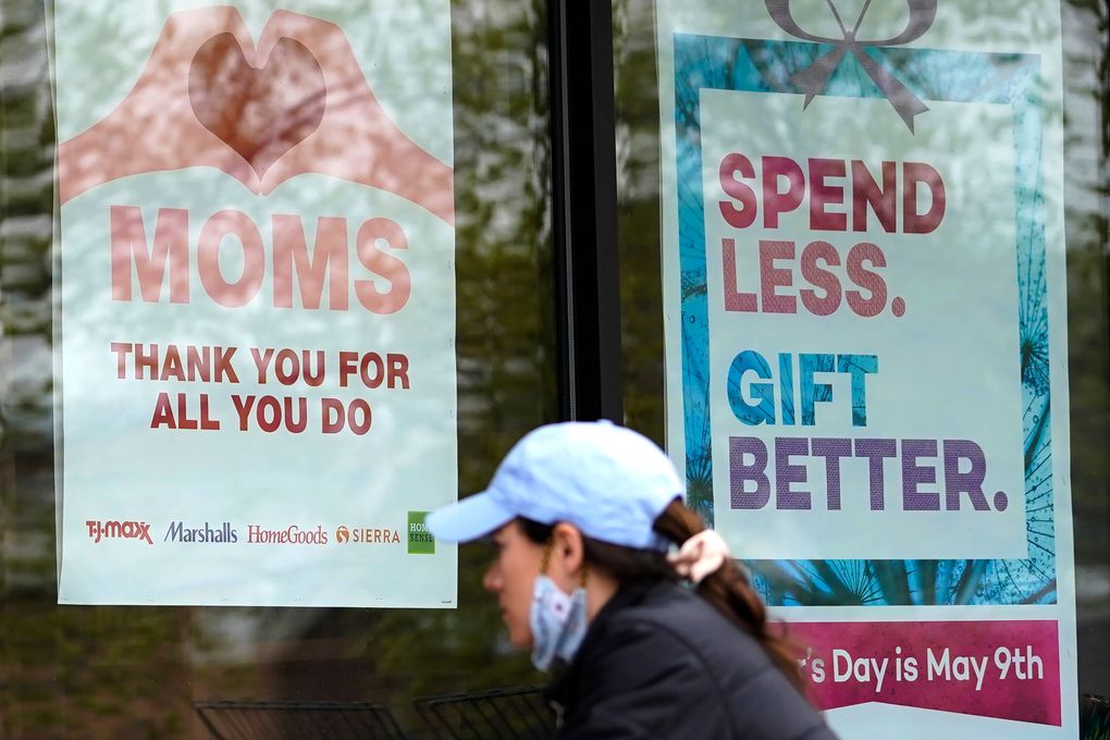 Signs about Mother’s Day are displayed at a home decor department store in Northbrook, Ill., Saturday, May 8, 2021. (AP Photo/Nam Y. Huh)