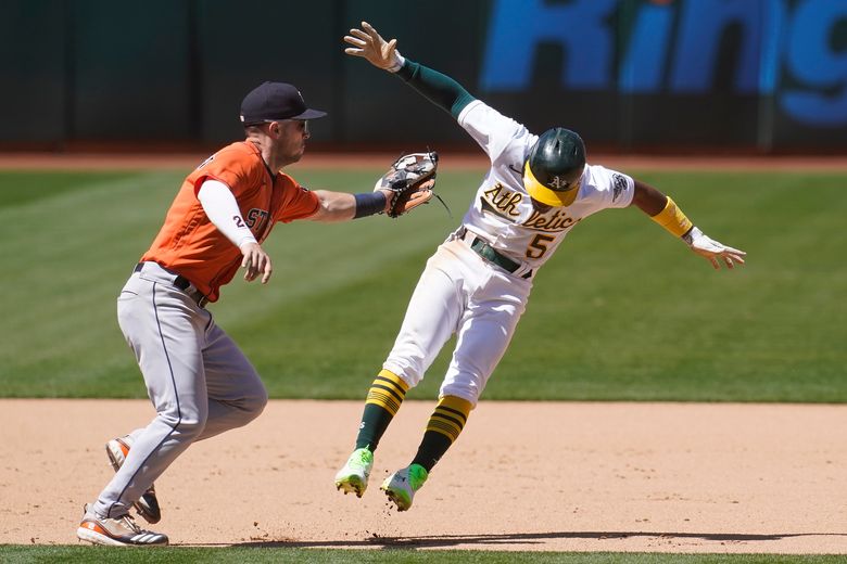 Maldonado's 3 RBIs lead Astros over A's 8-4 and into 1st