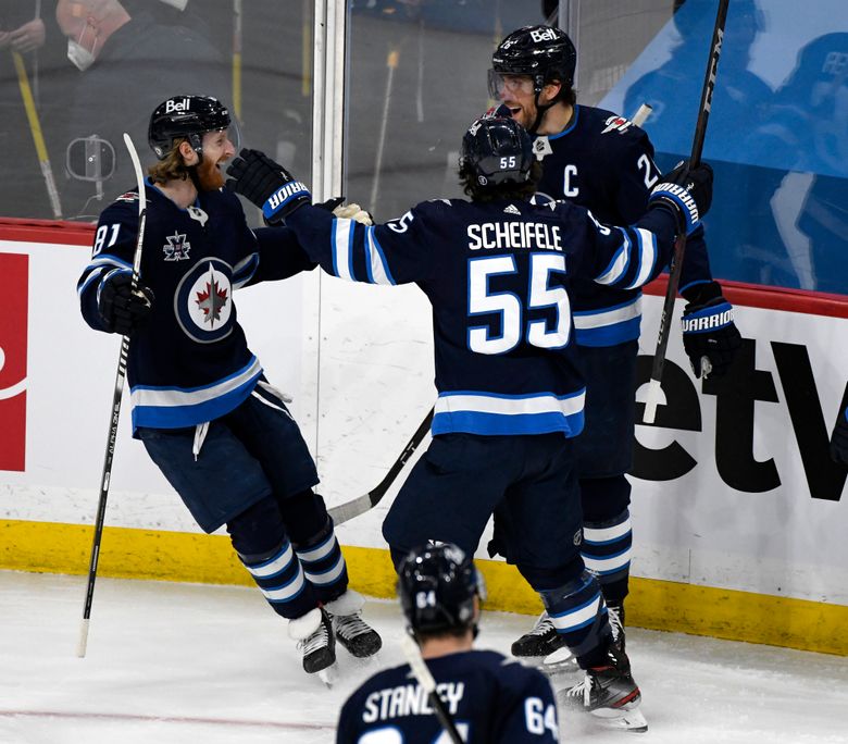 Wheeler helps Jets beat Canucks, clinch 3rd place in North - The