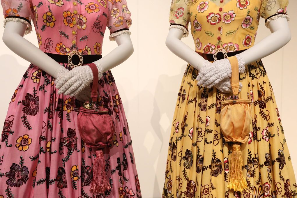 The costumes for Cinderella’s stepsisters, Anastasia and Drizella, were designed by Sandy Powell for the 2015 film “Cinderella.” Part of an exhibit of more than 70 Disney costumes, they are on view at MoPOP starting June 5. (Ken Lambert / The Seattle Times)