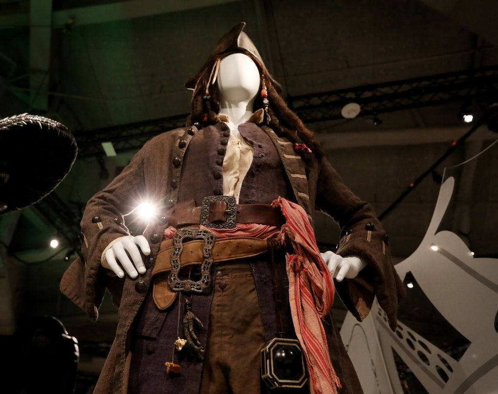 Johnny Depp played Capt. Jack Sparrow in this costume designed by Penny Rose for the movie “Pirates of the Caribbean: Dead Man’s Chest.” The costume is now on display as part of the “Heroes and Villains: The Art of the Disney Costume” exhibit opening June 5 at MoPOP. (Ken Lambert / The Seattle Times)