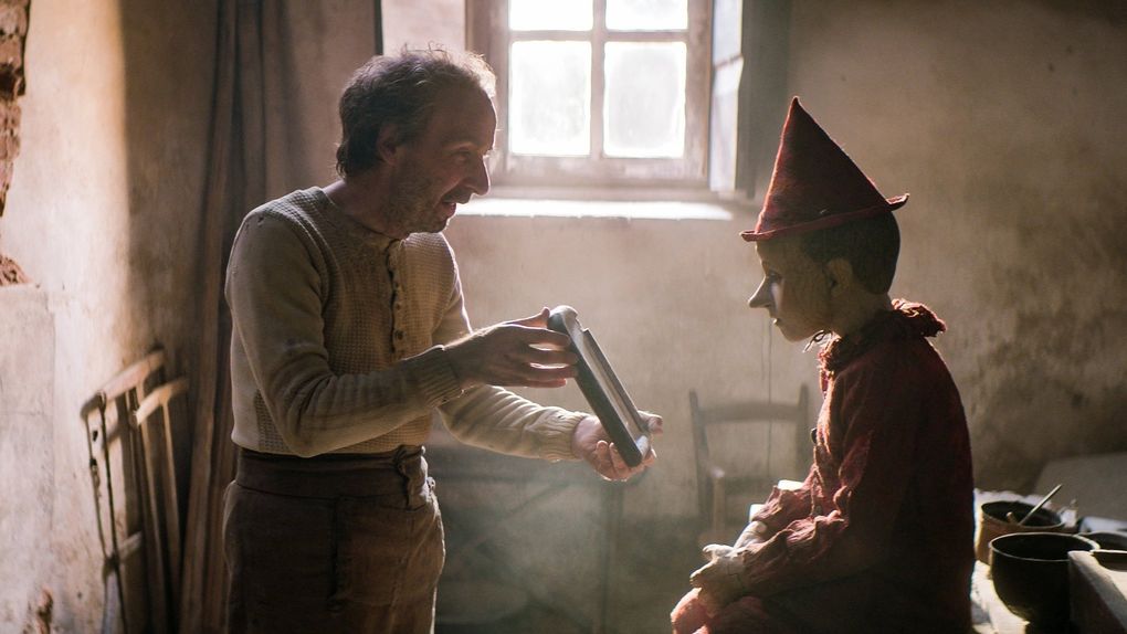 Roberto Benigni, left, and Federico Ielapi in “Pinocchio.” (Lionsgate)