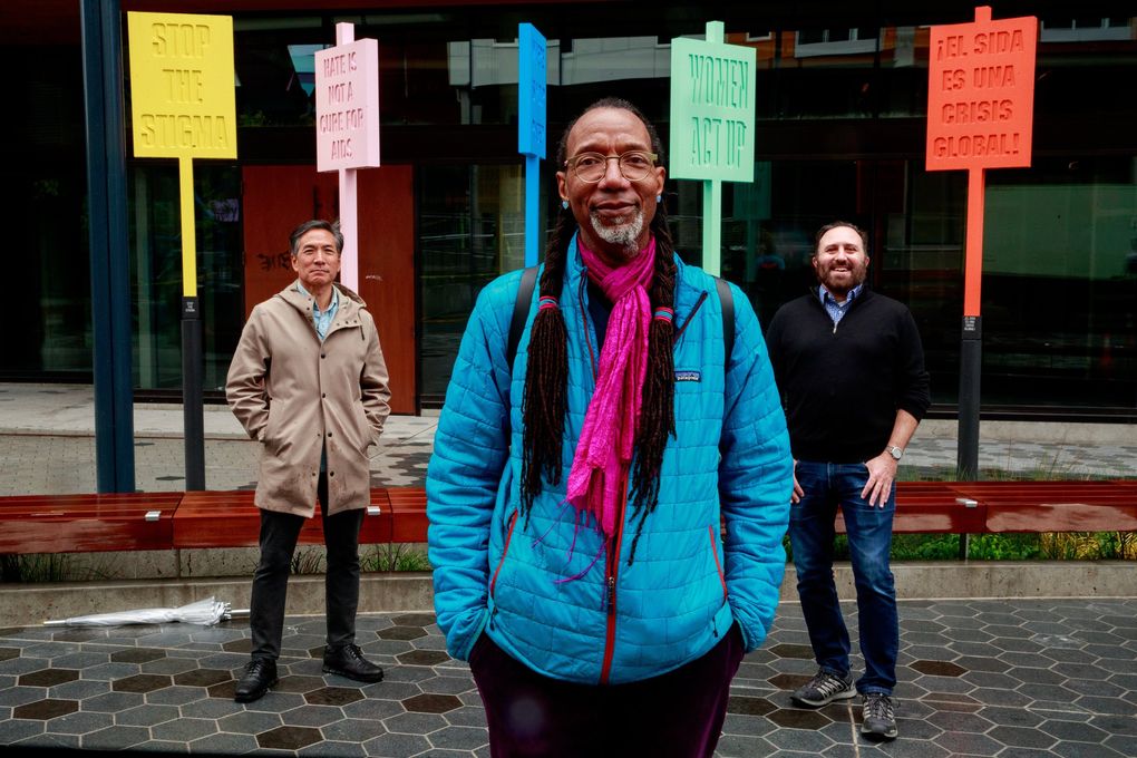 From left: Jeff Sakuma, steering committee member for Seattle’s AIDS Memorial Pathway; Rosette Royale, story collection and engagement consultant for the AMP; and Jason Plourde, project manager for the AMP, at the AMP on Capitol Hill on May 27, 2021. (Erika Schultz / The Seattle Times)