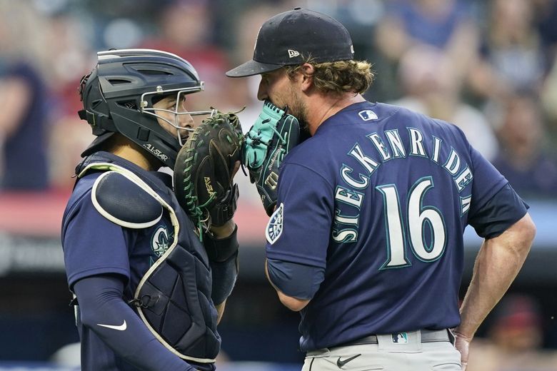 Seattle Mariners' Jose Godoy draws a walk during the ninth inning