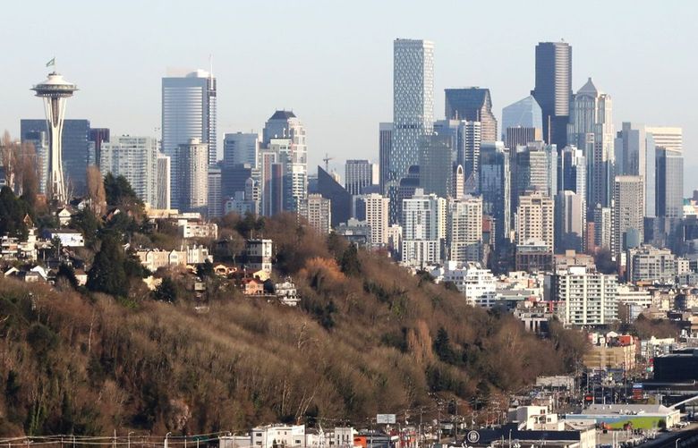 The Seattle skyline with the SW edge of  Queen Anne Hill in the foreground., left. This view of the Seattle skyline is from Ella Bailey Park in Magnolia.  LO LO LO 216552