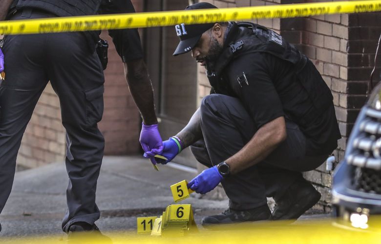 Atlanta police were called to southeast Atlanta’s Sweet Auburn neighborhood following a double shooting Friday, May 28, 2021. Police said two men were rushed to the hospital after gunfire erupted near the intersection of Edgewood Avenue and William H. Borders Sr. Drive about 7 a.m. The victims, who both appear to be in their 20s, were shot multiple times are listed in critical condition, Channel 2 Action News reported. It’s unclear what led to the shooting or how many shots were fired, but investigators at the scene appeared to collect more than a dozen shell casings from the ground. Police told Channel 2 they are reviewing footage from nearby surveillance cameras and looking to identify a blue sedan that was used in the shooting. The road was shut down due to the heavy police presence. (John Spink/Atlanta Journal-Constitution/TNS) 19001242W 19001242W