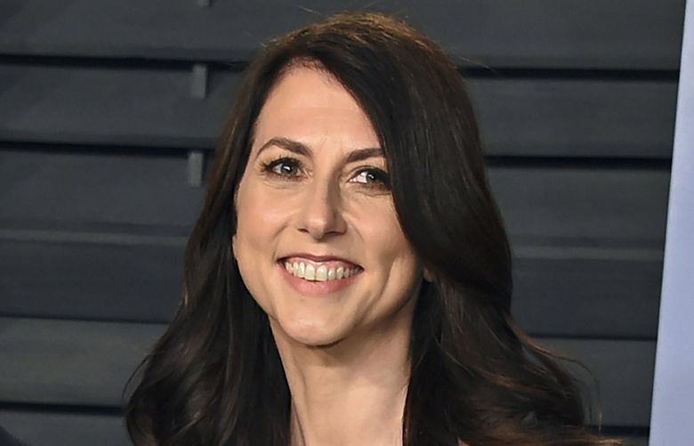 FILE – In this March 4, 2018, file photo, then-MacKenzie Bezos arrives at the Vanity Fair Oscar Party in Beverly Hills, Calif. Scott, philanthropist, author and former wife of Amazon founder Jeff Bezos, has married a Seattle science teacher. Dan Jewett wrote in a letter to the website of the nonprofit organization the Giving Pledge, on Saturday, March 6, 2021, that he was grateful to be able to marry such a generous person and was ready to help her give away her wealth to help others. (Photo by Evan Agostini/Invision/AP, File)