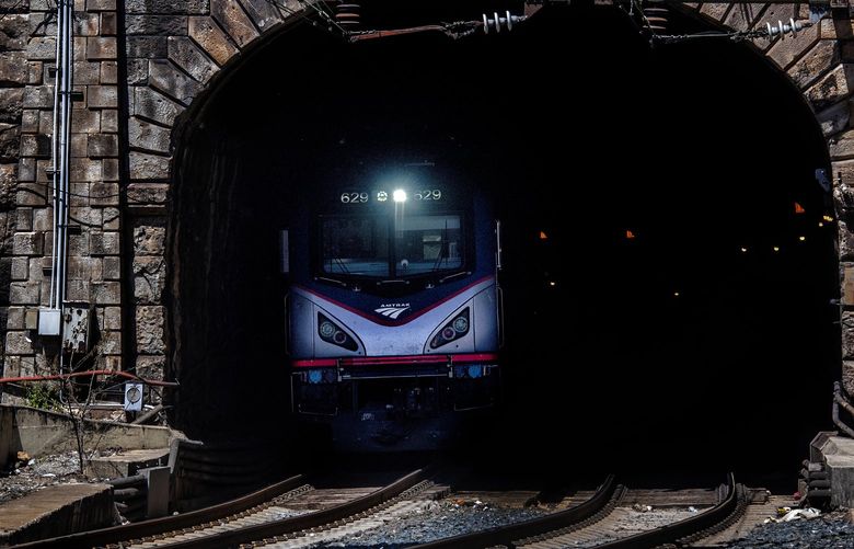 A train in Baltimore exits the John Street Tunnel, part of a tunnel system Amtrak has proposed upgrading with investment of billions of dollars. MUST CREDIT: Washington Post photo by Bill O’Leary.