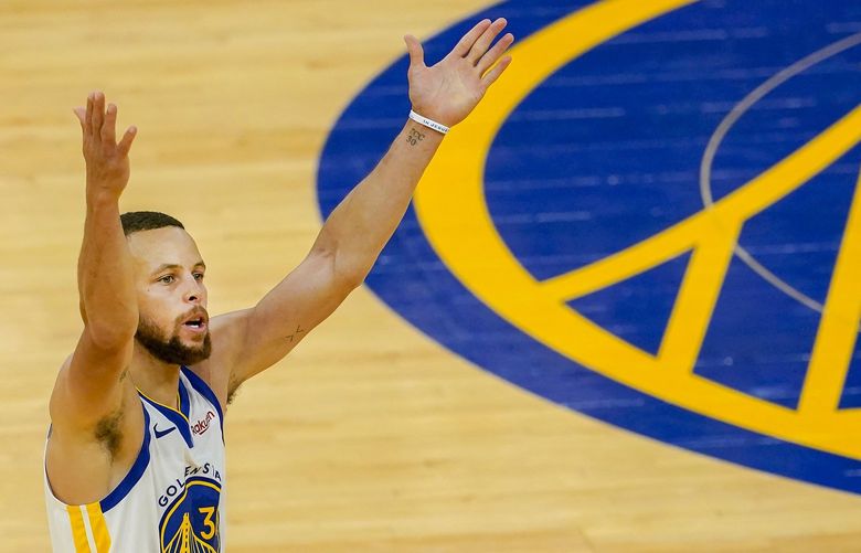 Golden State Warriors guard Stephen Curry (30) gestures after shooting a 3-point basket against the Memphis Grizzlies during the second half of an NBA basketball game in San Francisco, Sunday, May 16, 2021. (AP Photo/Jeff Chiu) CAJC126