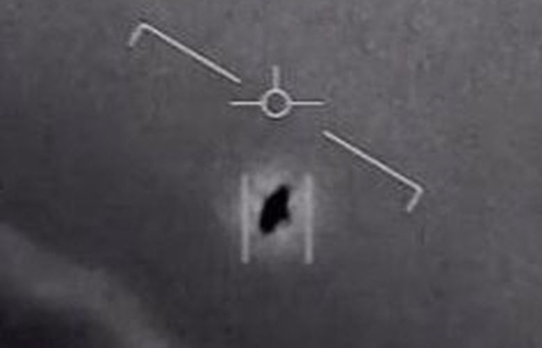 In an undated handout image taken from a video released by the Defense Department’s Advanced Aerospace Threat Identification Program, a 2004 encounter near San Diego between two Navy F/A-18F fighter jets and an unknown object. UFOs have been repeatedly investigated over the decades in the United States, including by the American military. (U.S. Department of Defense via The New York Times) –EDITORIAL USE ONLY —  XNYT13