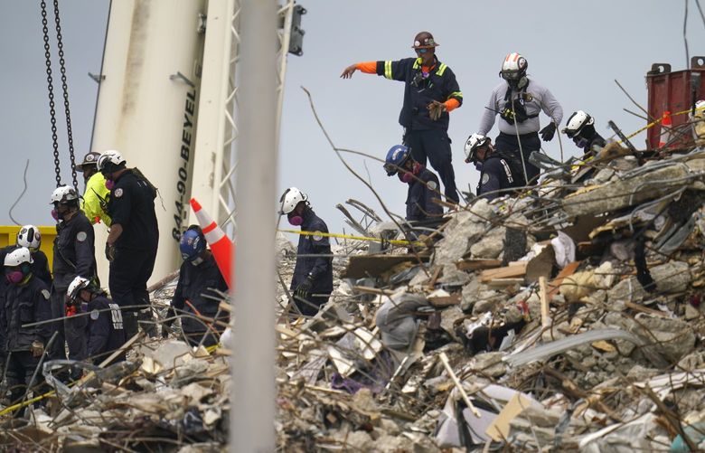 Crews work in the rubble of Champlain Towers South residential condo, Tuesday, June 29, 2021, in Surfside, Fla. Many people were still unaccounted for after Thursday’s fatal collapse. (AP Photo/Gerald Herbert) MIA10 MIA10