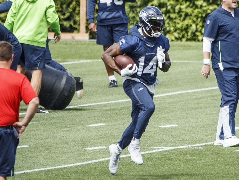 Seattle Seahawks wide receiver DK Metcalf (14) catches the ball