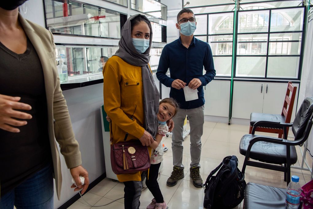 The family arrived for coronavirus testing at a clinic the day before their departure. (Kiana Hayeri / The New York Times)