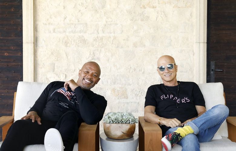LOS ANGELES-CA-JUNE 11, 2021: Dr. Dre, left, and Jimmy Iovine, both music moguls from humble roots, are photographed at Dr. Dre’s home in Los Angeles on Friday, June 11, 2021. The two are launching a new public high school in South L.A. to open in Fall 2022. It will be a magnet high school, under the jurisdiction of L.A. Unified and housed at Audubon Middle School in Leimert Park. Students from across the district can apply but the program will be particularly targeted for the South L.A. area. (Christina House / Los Angeles Times)