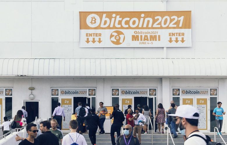 People outside Bitcoin 2021 in Miami on June 4, 2021. The FBI’s recovery of Bitcoins paid in the Colonial Pipeline ransomware attack showed cryptocurrencies are not as hard to track as it might seem. (Alfonso Duran/The New York Times)