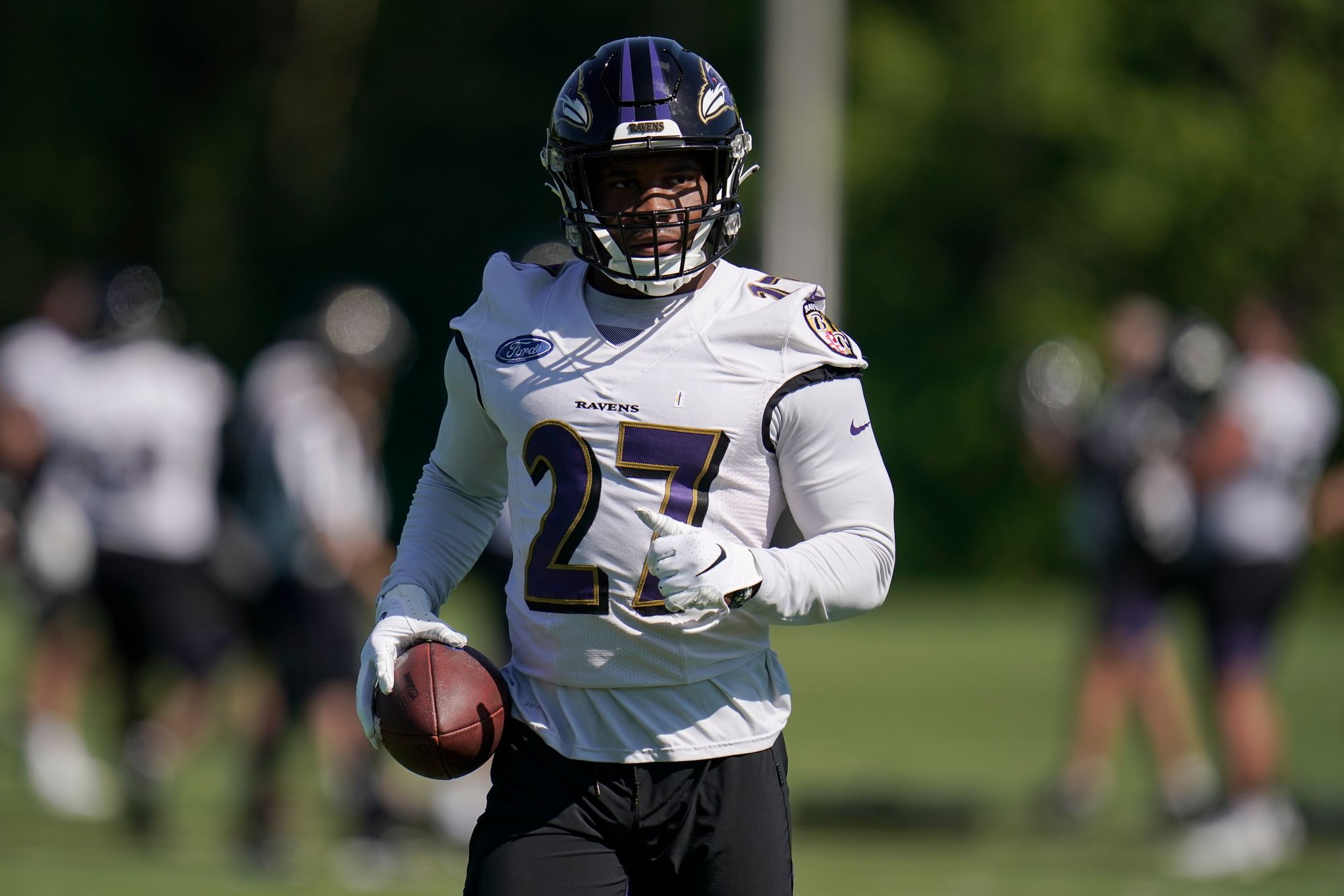 No, Baltimore Ravens running back Gus Edwards isn't going to stop