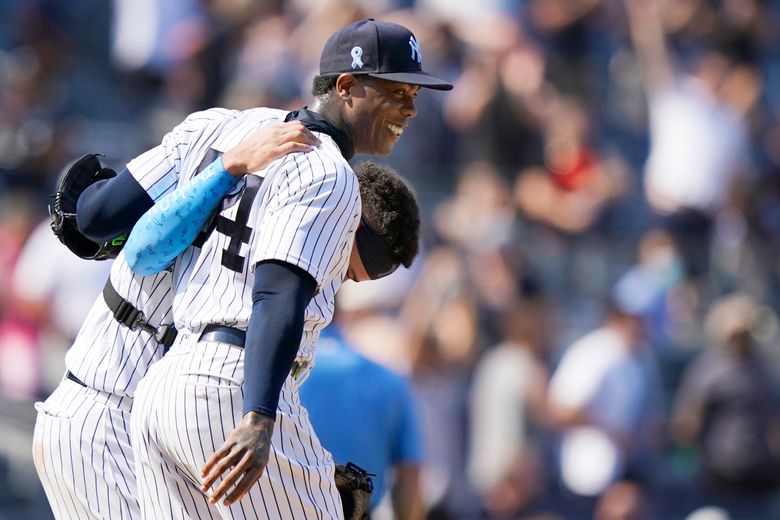 Yankees give up 2 hits, both homers, settle for split with Rays