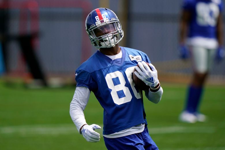 New York Giants wide receiver Darius Slayton (86) gets tackled by