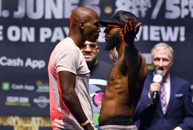 Chad Johnson poses for photographers during a weigh-in Saturday