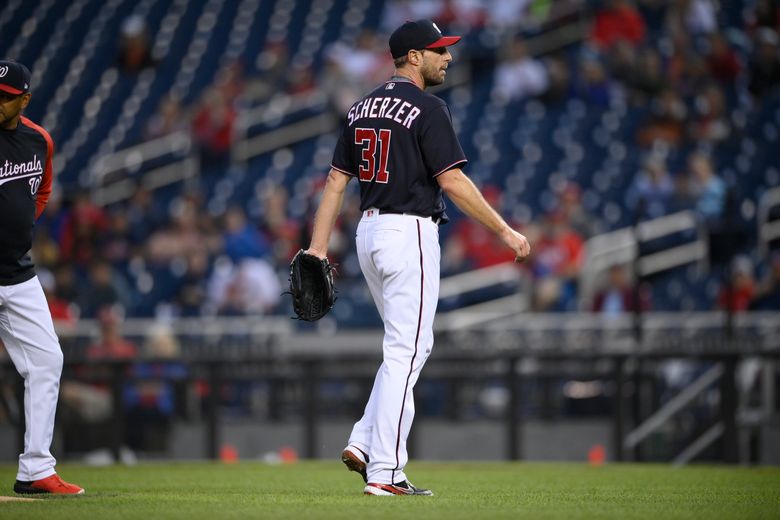 Washington Nationals' Max Scherzer hits first career homer, then leaves game