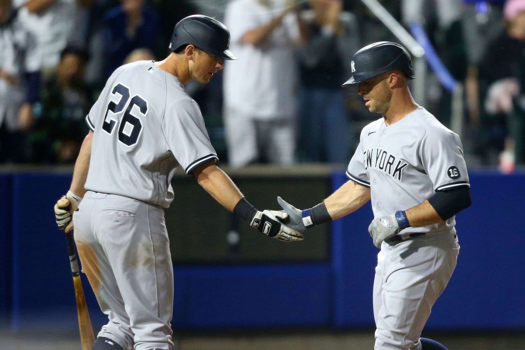 New York Yankees Gary Sanchez, right, celebrates his two=run home run with Miguel  Andujar during the seventh inning of the team's baseball game against the  Toronto Blue Jays, Wednesday, June 16, 2021