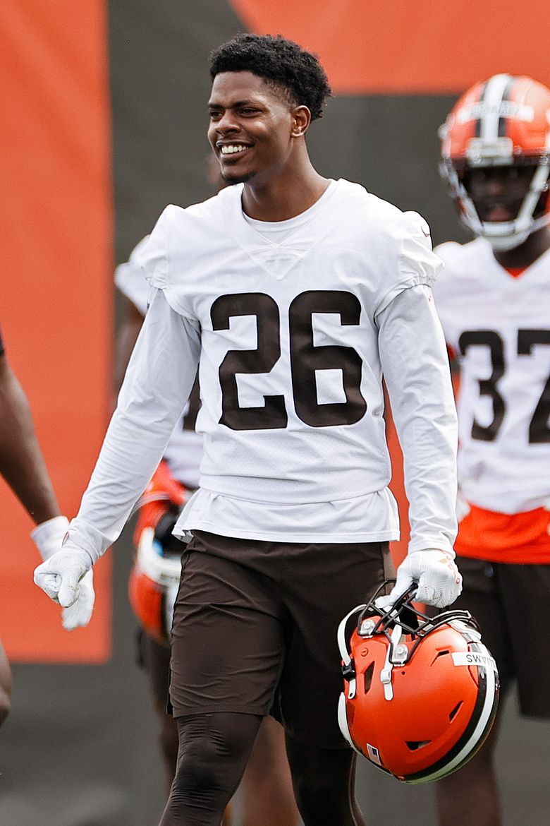 Cleveland Browns cornerback Greg Newsome II watches during a drill