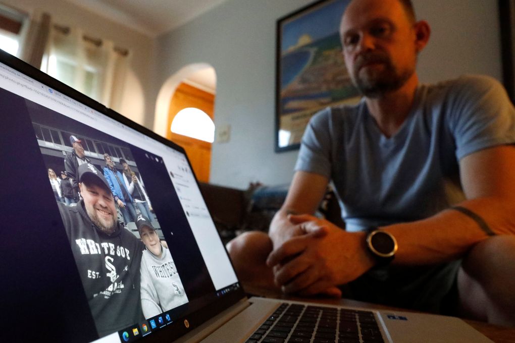 Christian Hainds displays a picture of himself when he was around 230 pounds displayed on a computer screen, Monday, June 7, 2021, in Hammond, Ind. Health officials have warned since early on in the pandemic that obesity and related conditions such as diabetes were risk factors for severe COVID-19. It wasn’t until he was diagnosed as diabetic around the start of the pandemic that he felt the urgency to make changes. Hainds lost about 50 pounds during the pandemic, and at 180 pounds and 5 feet, 11 inches tall is no longer considered obese. (AP Photo/Shafkat Anowar)