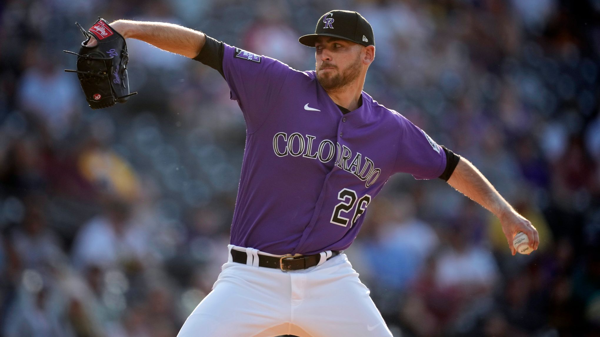 Rockies practice under Coors Field lights