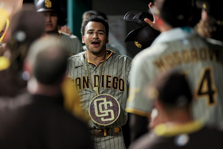 Grisham hits grand slam, solo shot, Padres beat Reds 7-5