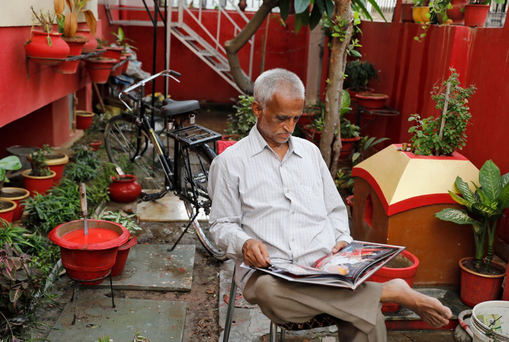 Radha Gobindo Pramanik looks through a family album while sitting in his yard in Lucknow, India, Thursday, June 3, 2021. Pramanisk’s wife, his daughter and his unborn grandchild succumbed to the coronavirus along with tens of thousands of others as it ravaged the country in April and May. As India emerges from its darkest days of the pandemic, families across the country are grieving all that they’ve lost and are left wondering if more could have been done to avoid this tragedy. (AP Photo/Rajesh Kumar Singh)