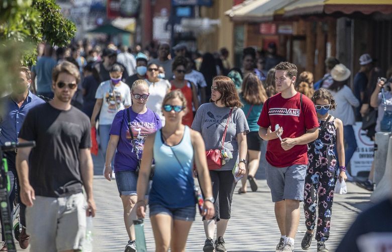 Tuesday, June 30, 2021.    King County lifted it’s restrictions on wearing a mask today for everyone who is vaccinated. Tourists on Seattle’s waterfront were crowding the businesses and enjoying the weather without masks.   217529