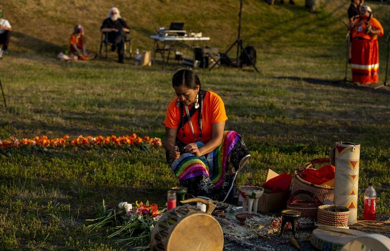 ALKI BEACH –  LO-LINES ONLY-INDIGENOUS CHILDREN VIGIL- 070121


Ixtli Salinas-Whitehawk,45, a community organizer lights candles at an altar during a vigil on Thursday, July 1, 2021 at Alki Beach. Hundreds of Indigenous children’s bodies were discovered in unmarked graves near former residential boarding schools  in Canada.  Indigenous communities across the country  gathered to mourn the losses and be with community.