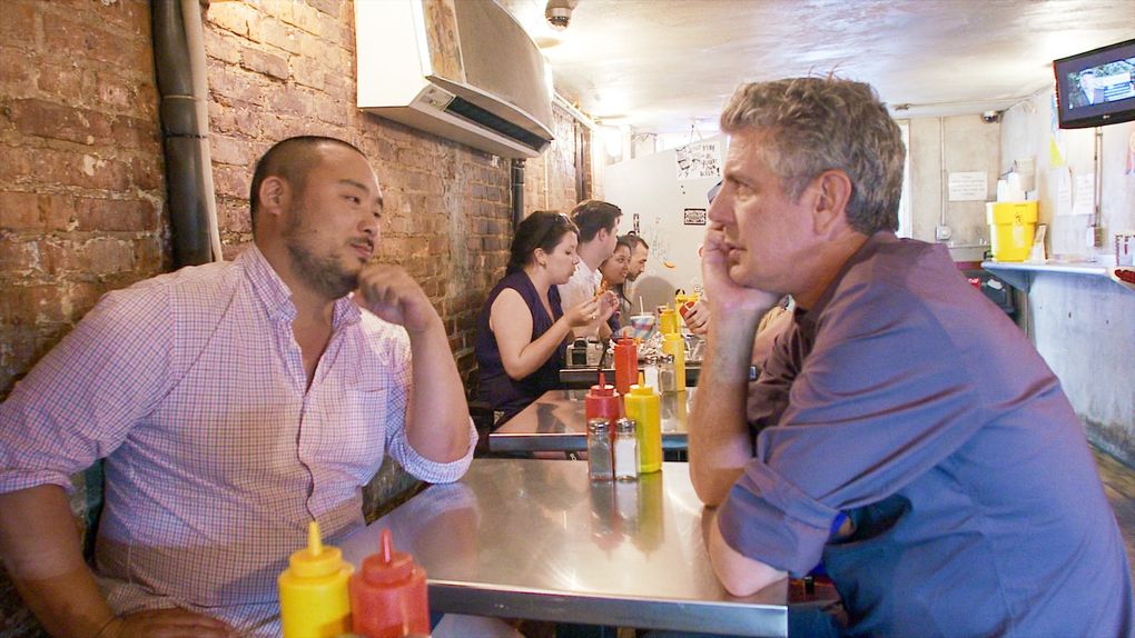 David Chang, left, and Anthony Bourdain in “Roadrunner.” (Zero Point Zero / Focus Features)