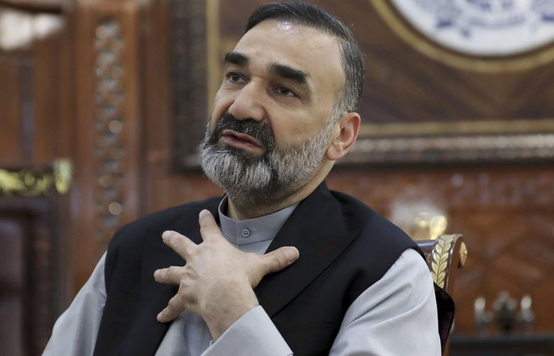 Ata Mohammad Noor, chief of Jamiat-e-Islami and a powerful northern warlord, speaks during an interview with the Associated Press at his house in Mazar-e-Sharif north of Kabul, Afghanistan, Thursday, July 8, 2021. One of the most powerful warlords of northern Afghanistan and a key US ally in the 2001 defeat of the Taliban blames a fractious Afghan government and an “irresponsible” American departure for a swift series of recent Taliban gains across the north. (AP Photo/Rahmat Gul) XRG104 XRG104