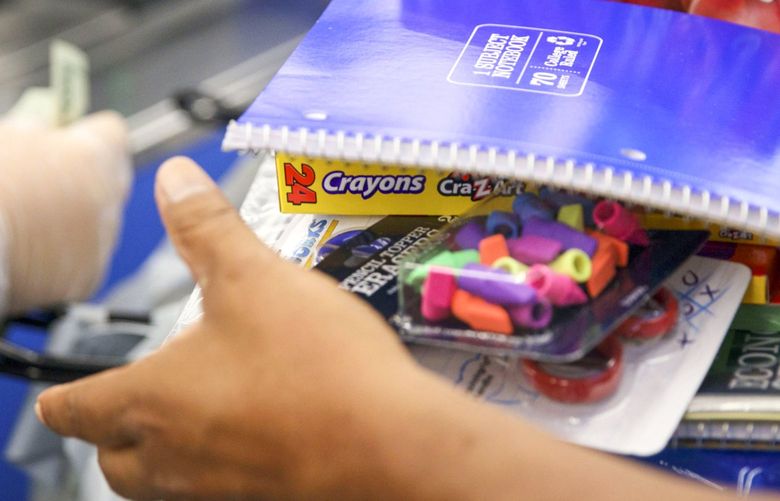 School supplies are bagged at a cash register at a Wal-Mart Stores Inc. location in Burbank, California, U.S., on Tuesday, Aug. 8, 2017. Wal-Mart Stores is scheduled to release earnings figures on August 17. Photographer: Patrick T. Fallon/Bloomberg 775020699