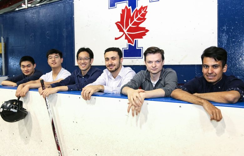 From left to right: Albert Loa, Michael Shin, Timothy Chan, Yusuf Shalaby, Ben Potter, and Rafid Mahmood sit on the bench of at Varsity Stadium in Toronto, Ontario, Canada, in 2017. The group created a tool that allow fans to step into Kraken GM Ron Francis’ shoes ahead of the Seattle expansion draft on Wednesday.