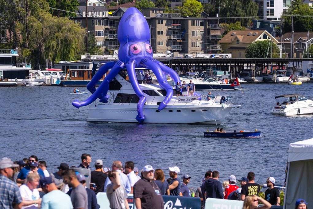 A Kraken tops a boat that is part of the flotilla of fans who turned out for the NHL Expansion Draft on Wednesday afternoon at Gas Works Park in Seattle. (Dean Rutz / The Seattle Times)