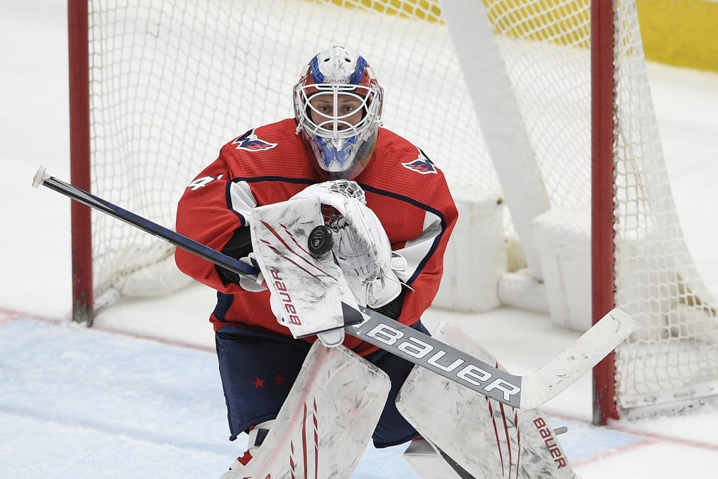 Washington Capitals goaltender Vitek Vanecek (41) stops the puck during the third period of an NHL hockey game against the Boston Bruins, Tuesday, May 11, 2021, in Washington. (Nick Wass / AP)