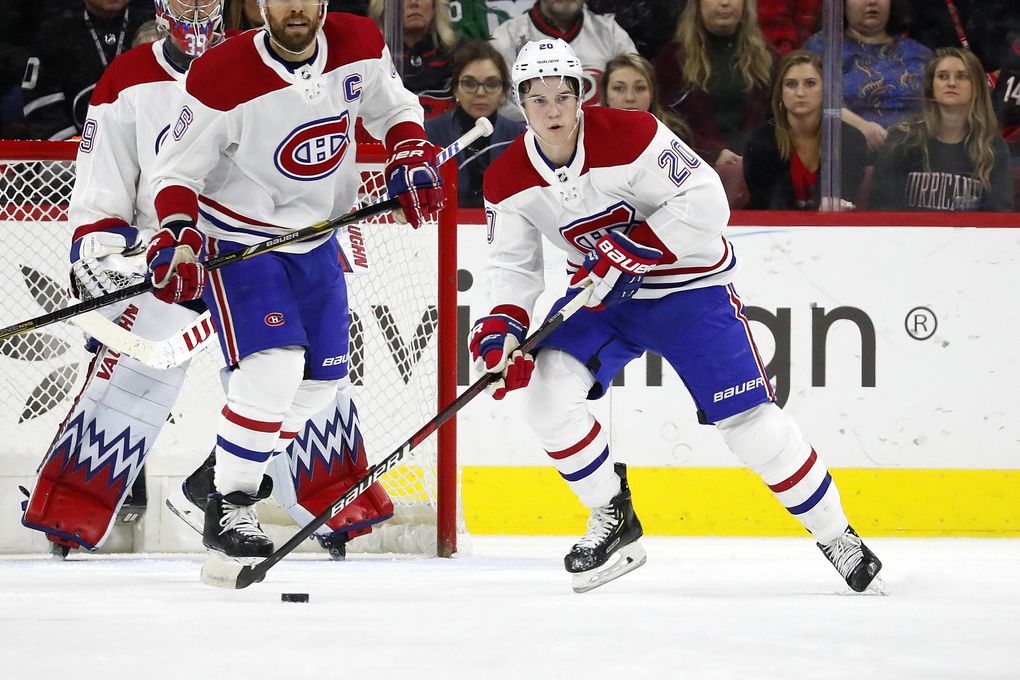 Montreal Canadiens’ Cale Fleury (20) looks to pass the puck against the Carolina Hurricanes during the first period of an NHL hockey game in Raleigh, N.C., Tuesday, Dec. 31, 2019. (Karl B DeBlaker / AP)