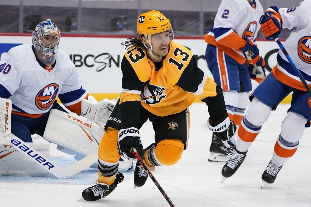 Pittsburgh Penguins’ Brandon Tanev (13) plays in Game 2 of an NHL hockey Stanley Cup first-round playoff series against the New York Islanders in Pittsburgh, Tuesday, May 18, 2021. (Gene J. Puskar / AP)